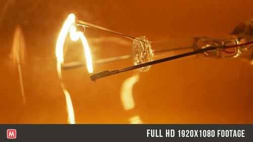 Glowing Lightbulb Filament Close-Up