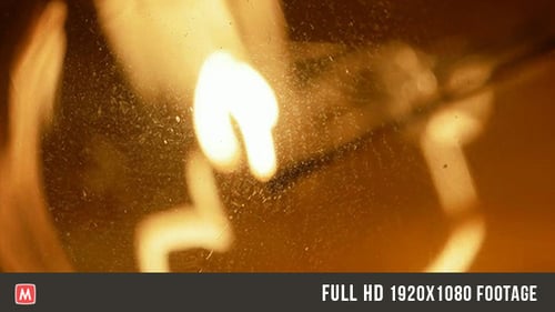 Illuminated Light Bulb Filament in Macro Close Up