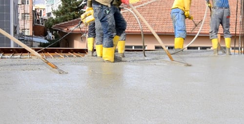 Foundry Workers Pours Of Concrete Blocks