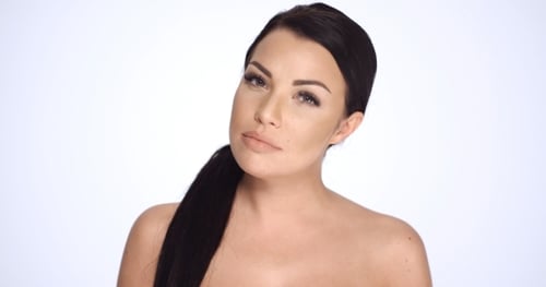 Beautiful Woman Posing Close-up in Studio Setting