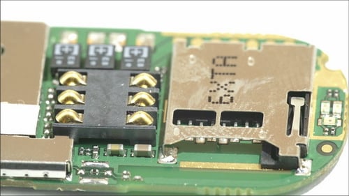 Soldered Chips from a USB Stick Processor