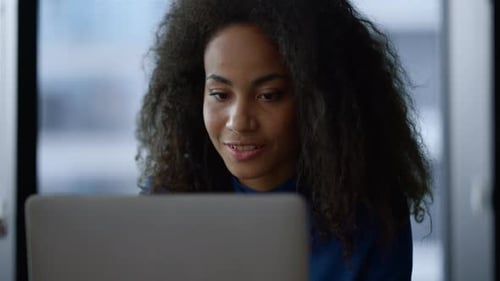 African American Business Woman Working Laptop Surfing Internet in Home Office