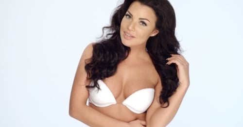 Woman Posing in Bra on White Background Woman Posing in Bra on White Background