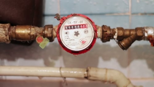 Water Meter Closeup Shows Usage in Home