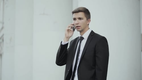 Young Adult Man Talking on the Phone