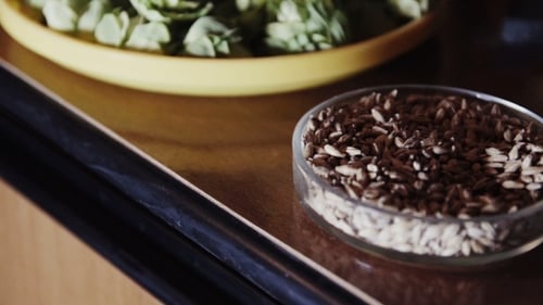 Bowl of Grains on Wooden Table