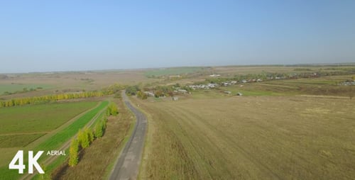 Flying Above Road and Fields