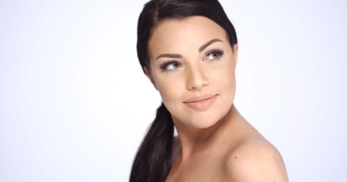 Elegant Woman Posing in a Studio