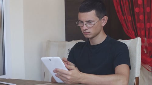 Young Student Using Tablet