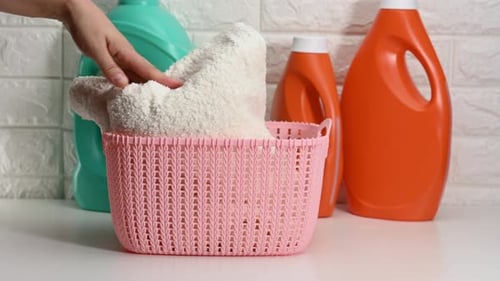 Laundry Basket Filled With Colorful Clean Towels