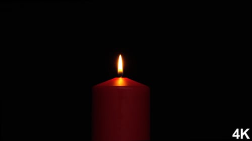 Close Up of a Red Candle Burning
