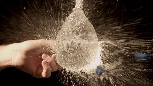 Water Balloon Bursting in Slow Motion Close-Up