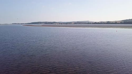 Lympstone estuary at high tide. United Kingdom. 4K Aerial footage.