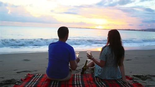Family Having a Picnic on the Beach