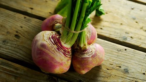 Close-up of kohlrabi on wooden table