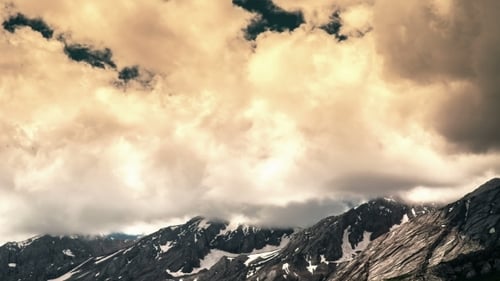 Most Clouded Sky High Above The Mountains