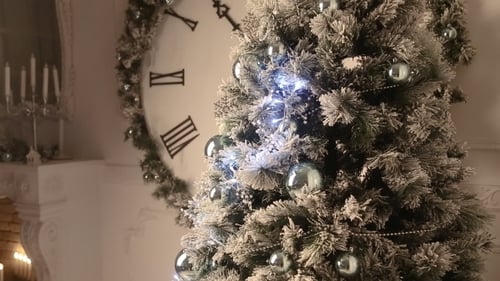 Christmas Tree Decorated with Silver Ornaments