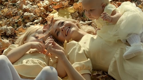 Happy Family Mother And Children In Autumn Park