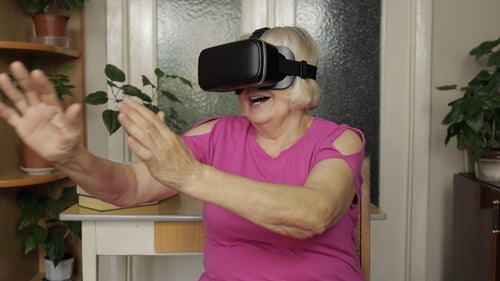 Senior Woman Exploring Virtual Reality with VR Headset