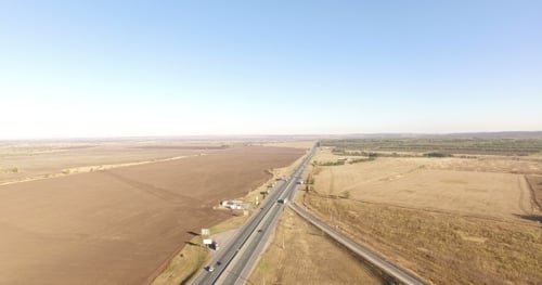 Aerial View Of a Traffic Driving On a Motorway