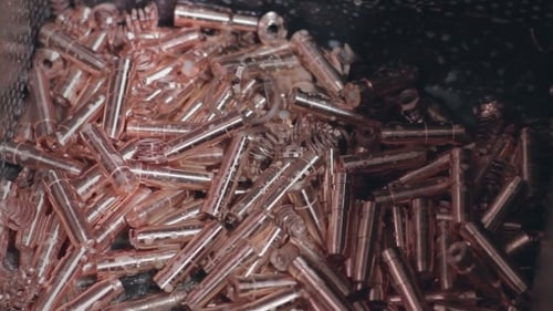 Close Up of Metallic Machine Components With Water