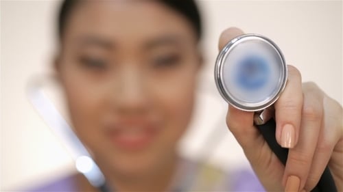 Friendly Healthcare Professional with Stethoscope Close Up