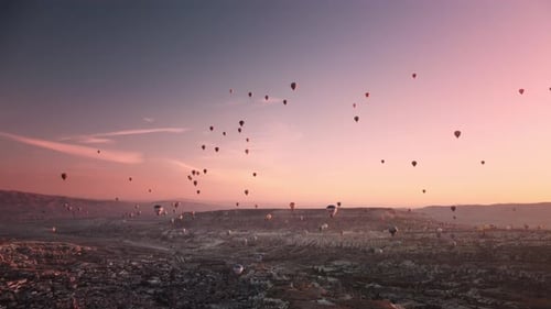 Hot Air Balloons Fly Over Cappadocia at Sunrise