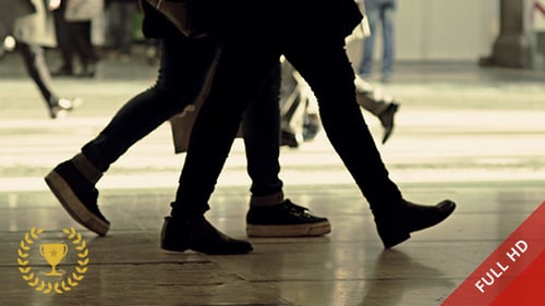 Pedestrians Legs Walking in a Busy City