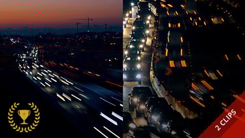 Aerial View of Traffic Flowing on Freeway at Night