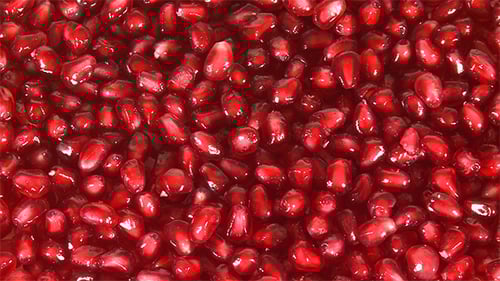 Vibrant Red Pomegranate Seeds Close Up View