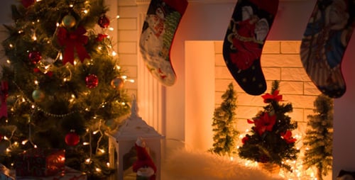 Festive Christmas Scene by Fireplace at Night