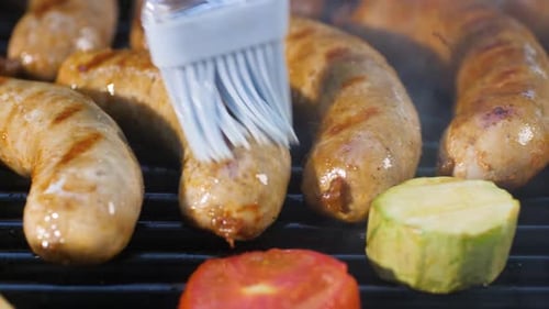Sausages and Vegetables Sizzle on Barbeque Grill