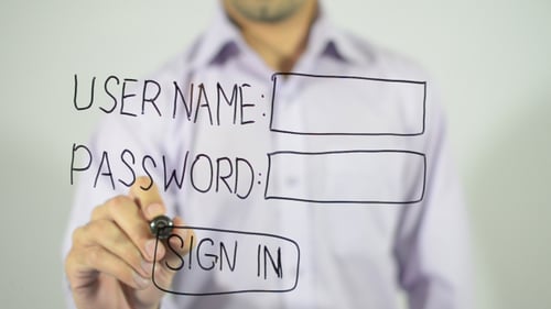 Man Writes Username Password Sign In On Glass