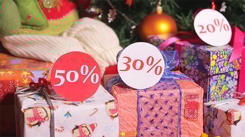 Christmas Tree Decorated with Ornaments and Sale Tags