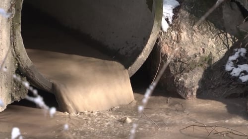 Drainage Pipe Flowing into Waterway