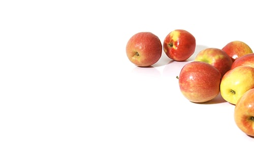 Apples Rolling on White Background