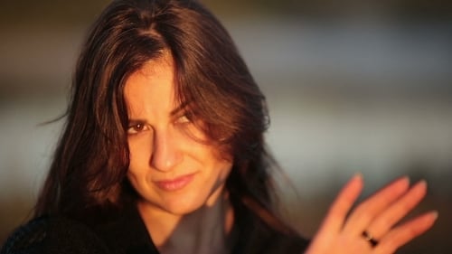 Young Brunette Woman Enjoying The Sun Rays