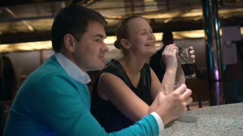Young Couple Relaxing In Bar And Having Drinks