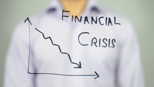 Drawing Financial Crisis Graph Pointing Downward