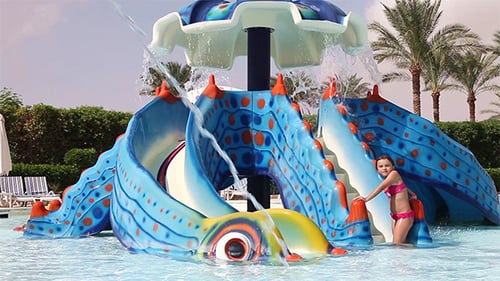 Little Girl Having Fun in a Swimming Pool
