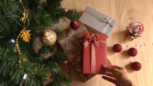 Putting Christmas Gift