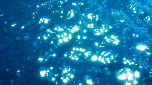 Shimmering Light Reflecting on a Blue Ocean