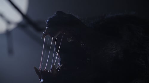 Terrifying Monster Snarling in the Dark