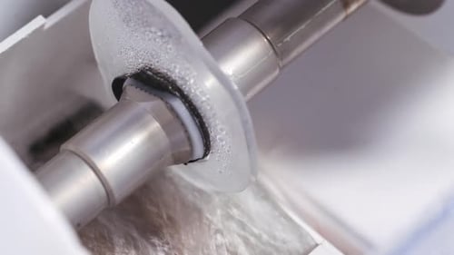 Close Up of Wet Metal Machine Part