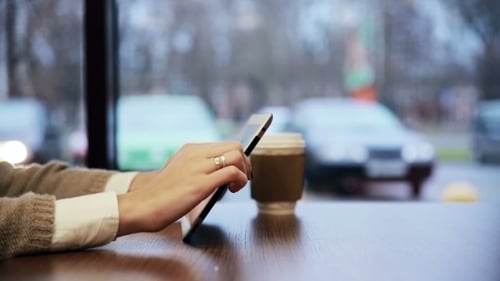 Woman Hands Using Tablet Touchscreen In Cafe