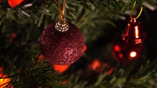 Festive Christmas Tree Decorated with Burgundy Ornament