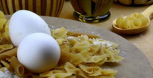Uncooked Pasta and Eggs Still Life Close Up