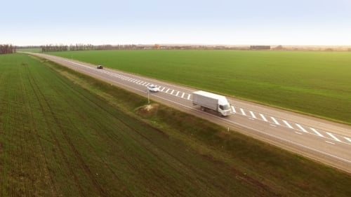Truck Driving On Country Road