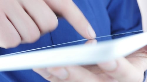 Hand Using Tablet, Scrolling Close-up