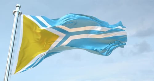 Realistic Waving Flag with Fabric Motion Against Blue Sky